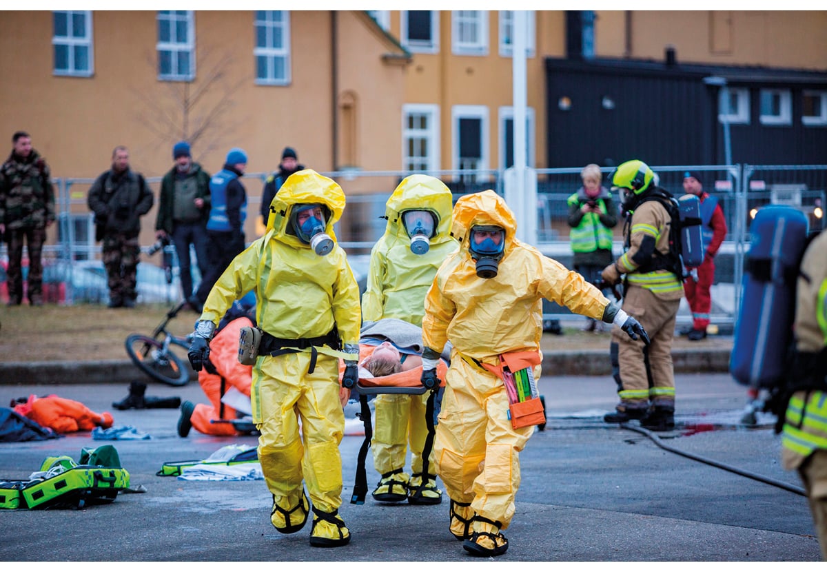 Figure 4.12 Local emergency services and the rescue service practice a nuclear incident in Norway.