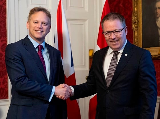 Image of the Secretary of State for Defence Grant Shapps (left), seen here shaking hands with the Norwegian Defence minister, Bjørn Arild Gram at a trilateral agreement between the UK, Norway, and Ukraine Dec. 11 2023.